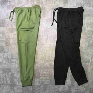 Męskie spodnie Męskie spodnie Joggers Bojowe kieszeń dla mężczyzn spodnie M-2xl 240308