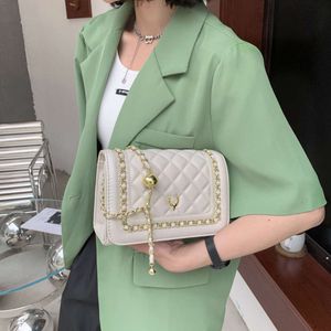 Shop Handbag Wholesale and Retail New Womens Bag Lingge Chain 2024 Summer New Camellia Flower Golden Ball Small Fragrance Single Shoulder Messenger Bag