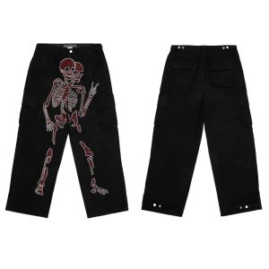 Pantaloni y2k pantaloni grafici da cranio uomo harajuku urface water water water cargo pantaloni da carico largo pantaloni streetwear hip hop