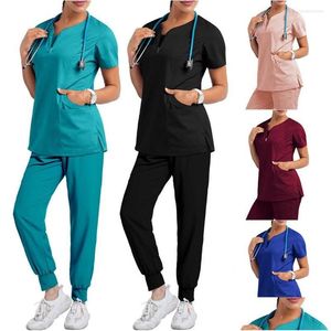 Calças femininas de duas peças Calças de duas peças esfrega mulheres trabalhando uniforme bolso mangas compridas roupas médicas tops conjunto de duas peças dhtpc