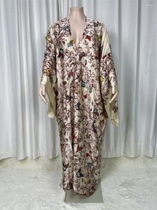 Kvinnors badkläder långärmad kimono tryckande pareo strandkläder baddräkt eleganta Afrika kvinnor boho cardigan sexig semester kimonos sommar 2024
