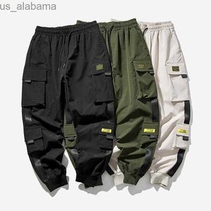 Calças masculinas Harem Joggers Cargo Pants para homens com fitas multi-bolsos Homem Sweatpants Mens S-5XL 240308