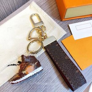 럭셔리 키 체인 디자이너 Unisex Key Chain Steeles Steel Keychain Mens Keychain good257U가있는 실제 가죽