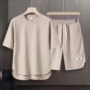 Uomo coreano moda waffle due pezzi set estivo maniche corte T-shirt e pantaloncini set larghi uomo abiti firmati tute 240228