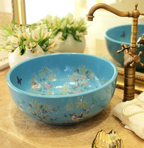 Lavabi in ceramica lavabo da appoggio bagno lavelli rotondi lavabo moda Lavello lavabo in ceramica artistica fiore e uccello blu8051802