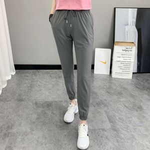 pantaloni firmati da donna Leggings rapidi estivi per esterni Pantaloni corti per lo sport Pieghe per il tempo libero Leggings da donna Miyake per donna Pantaloni lunghi slim fit in seta di ghiaccio firmati QONA