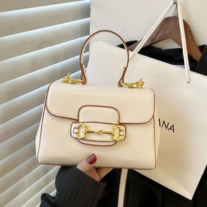 Store Online Handbag Clearance Promotion 2024 New Spring Fashion Simple Womens Shoulder Small Dign Horse Title Button Crossbody Bag