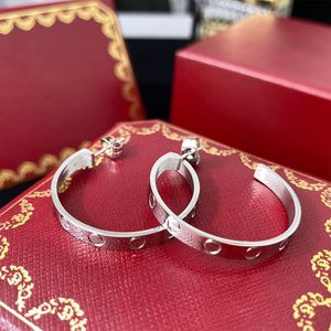 ラブメッキゴールドイヤリングクラシックデザイナーフープイヤリングスクリューbijoux luxury orecchiniデザイナーイヤリング冷たいスタイルのオーナメントトレンディZL167 F4