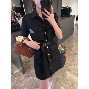 designer PA23 workwear style short sleeved lapel skirt design with classic inverted triangle logo pocket decoration and waist belt adjustment YBQT