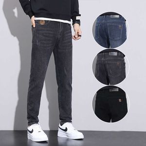 Calças compridas casuais masculinas on-line, lavadas com água, marca da moda sazonal, versátil, elástica, perna reta, jeans