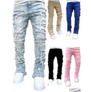Męskie dżinsy 2023 Męskie rozdarte spodnie dżinsowe Designerowie Jean Hombre Spodni mężczyźni haftowe Prace Zerwane dla Tren Motorcycle Pant Drop Gelive Dhyw6