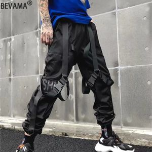 Mens preto hip hop streetwear fitas carta impressão calças funcionais macacão solto straigh carga sólida calças casuais 240305