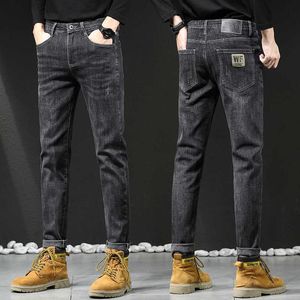 Primavera masculino jeans elástico pequeno tubo reto na moda marca moda calças casuais tendência