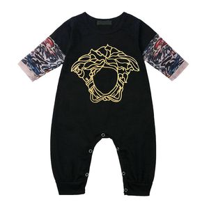 Recém -nascidos Baby Romances meninas e menino Managem longa Arm de flor de mola de algodão Roupa Carta de marca impressão infantil crianças crianças nossas