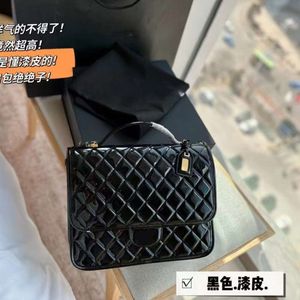 Loja bolsa promoção 2024 xiaoxiangfeng nova casual couro de patente 22k mochila caviar losango grande capacidade das mulheres