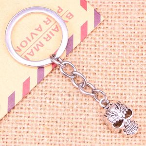 Nyckelringar 20st Fashion Keychain 21x13mm skeletthuvudskalle hängsmycken diy män smycken bil nyckelkedja ringhållare souvenir för gåva