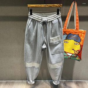 Erkek pantolon erkek moda harem sokak giysisi çizim elastik bel hip hop pantolon gevşek fit joggers eşofman erkek kıyafetler