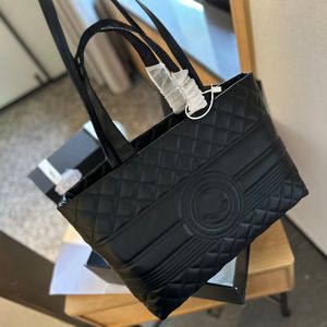 TOTE TOSP TOSP TOCTER Projektantka Women Bag na ramię 28 cm skórzana wytłoczona druk luksusowa torebka 28cm pod pachami torba na lotnisku Black Fashion Bag torebki mamusi