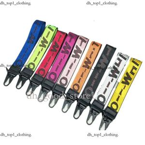 Offs White Keychain Lanyards Off White Keychain سلسلة المفاتيح المفتاحية الشفافة خطاب الهلام المطبوع للنساء نساء Canvas Camera Elndant الحزام الأبيض 272