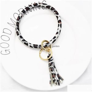 Charm Armbänder Leopardenmuster Pu-Leder Schlüsselanhänger Armband Armreif Schlüsselanhänger Kreis Schlüsselanhänger Quaste Halter Modeschmuck Drop Dhgarden Dhme2