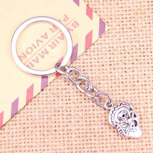 Nyckelringar 20st Fashion Keychain 22x15mm skalle i sombrero med gitarrhängen Diy Men smycken bil nyckelkedja souvenir för gåva