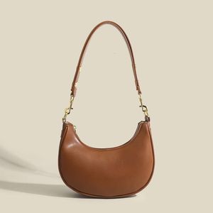 Saco de axilas de saída da loja com design de nicho 2024 texturizado ombro luz luxo crescente sela versátil portátil crossbody