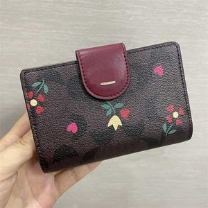 Kalp şeklindeki çanta unisex tasarımcı cüzdanları çoklu stil fermuarlı cüzdan modaya uygun moda kiraz çantası bölmesi klasik kart sahibi 240115 ile debriyaj çantası
