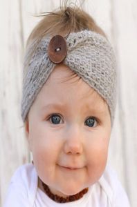Novo feito à mão bebê tricô crochê bandana moda meninos meninas headbands orelha mais quente com botão crianças acessórios de cabelo2927164