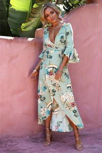 Casual klänningar 2024 Kvinnor som skriver ut lång maxi klänning V-ringning Petal Sleeve Beach Robes Oregelbunden längd Wrap Floral Holiday Vestidos