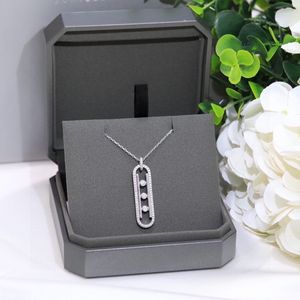 Hot selling sliding necklaces with full diamond hollowed out pendants, long sweaters, chain chains, bone chain accessories, as a gift for your best friend