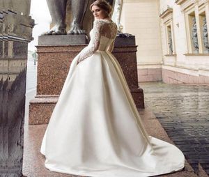 Modest Long Sleeve Wedding Dress 2020 New Scoop Satin Appliqued Aline Bridal Gown with Pockets Vestidos de Novia 135067110