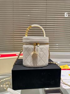 Tygväska för kvinna Luxurys handväska designer axel hink kvinnor väskor äkta läder pochette crossbody clutch påse dragstring hink väskor