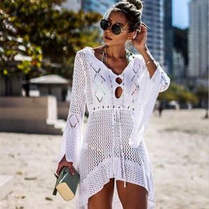Designer beach hollowed-out knitted women's stylish sexy beach dress with fringe waist lace-up