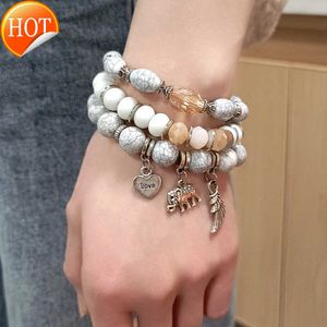 Charmarmband BZ1637 Fashion Grey Cracked Stone Peads Mixed Color Love Elephant Armband Womens Simple Temperament Jewelry