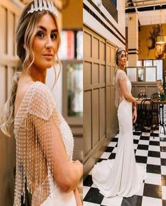 2019 Luxury Crystal Pärlade aftonklänningar Mantel Vit juvelhals Se om Back Zipper Boho Garden Bridal Gown Custom Made Part6085666