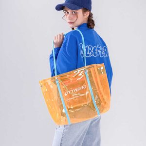 Bolsa transparente de verão feminina 2024 nova geléia de pvc grande capacidade bolsa de ombro praia 240312