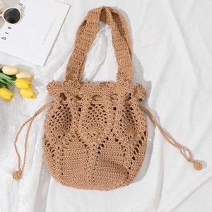 Hollow Single Shoulder Cotton Thread Woven Bag Ny handhållen blommorgräs Turism Vacation Beach 240312