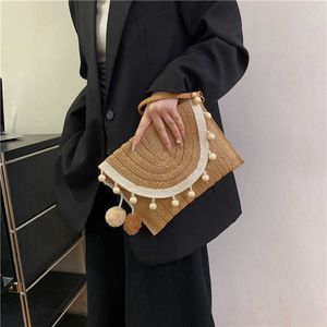 Spring and Summer Fashion Grass Woven Tassel Flipped Envelope Bag Weaving Splicing Single Shoulder Bag Unique Crossbody