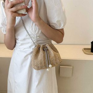 Unique Design Solid Color Drawstring Bucket Bag Summer Fashionable Grass Woven Bag Western Style Chain Crossbody