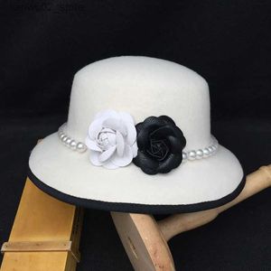 Шляпы с широкими полями Шляпы-ведра Высококачественная фетровая шляпа с белой камелией и жемчужной лентой из шерсти. Флоппи-женская свадебная церковная шляпа Шляпа Трилби со свиным пирогом Q240312
