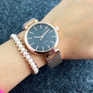 Luxus 2024 Modemarke Damen Mädchen Metall Stahlband Quarz-Armbanduhr GU35