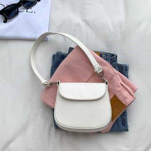 HBP Non-Brand Custom PU-Leder-Mini-Umhängetasche, modische Handtasche, einfache schlichte Schlinge, Bonbonfarbe, kleines Mädchen, rosa, weiße Hand