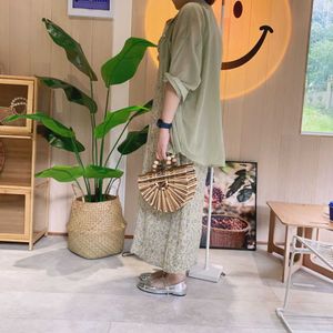 Beach Handbag Hollowed Out Pearl Woven Women s Bamboo Handmade Semi Circular Hand Held Beach Bag 240312