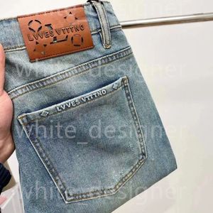 Högkvalitativ mäns jeans designer New 24SS Summer Street Men jeans tryckt byxor ungdom mode tätt midja midja elastisk smal passform liten fötter byxa