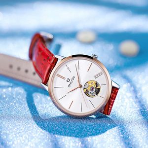 Orologio meccanico automatico Nuovo tipo di donna Completamente sottile scavato con inserto di diamanti Cintura elegante, trendy e alla moda impermeabile per orologio da donna