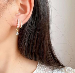 2024 Pearlörhängen Stud Delicate Drop Stud Earrings Fashion Double-Layer Pearl Mosquito Coil Ear Clip Water Drop Temperament Enkelt och smärtfritt grossist