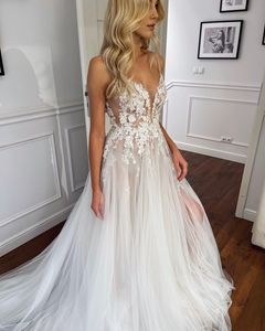 A Sexy Boho Line Wedding Dresses Spaghetti Straps Tulle Lace Appliques Sheer Side Split Bridal Gowns Wedding Dress Sweep Train ppliques