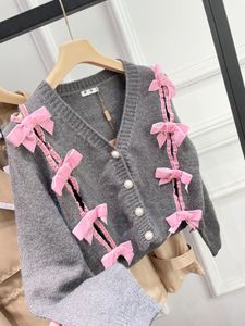 High version new bow knitted long sleeved cardigan women's knitted sweater