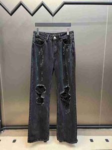 男性のジーンズの正しいバージョンBファミリーの23Sの洗浄された苦しんでいるジーンズは、水洗浄と摩耗技術、男性と女性の両方に適していますMLQ8