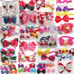 50pcs Lot Dog Apparel Pet Puppy Cat Cute Tow Turie Futhies Bowknot Dog Farel Produkty mieszane LY022324